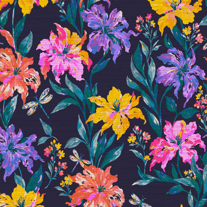 Firefly Social Floral Dragonfly Wallpaper in Evening Bloom on grasscloth: vivid pink, purple, orange and yellow lilies on a deep navy ground
