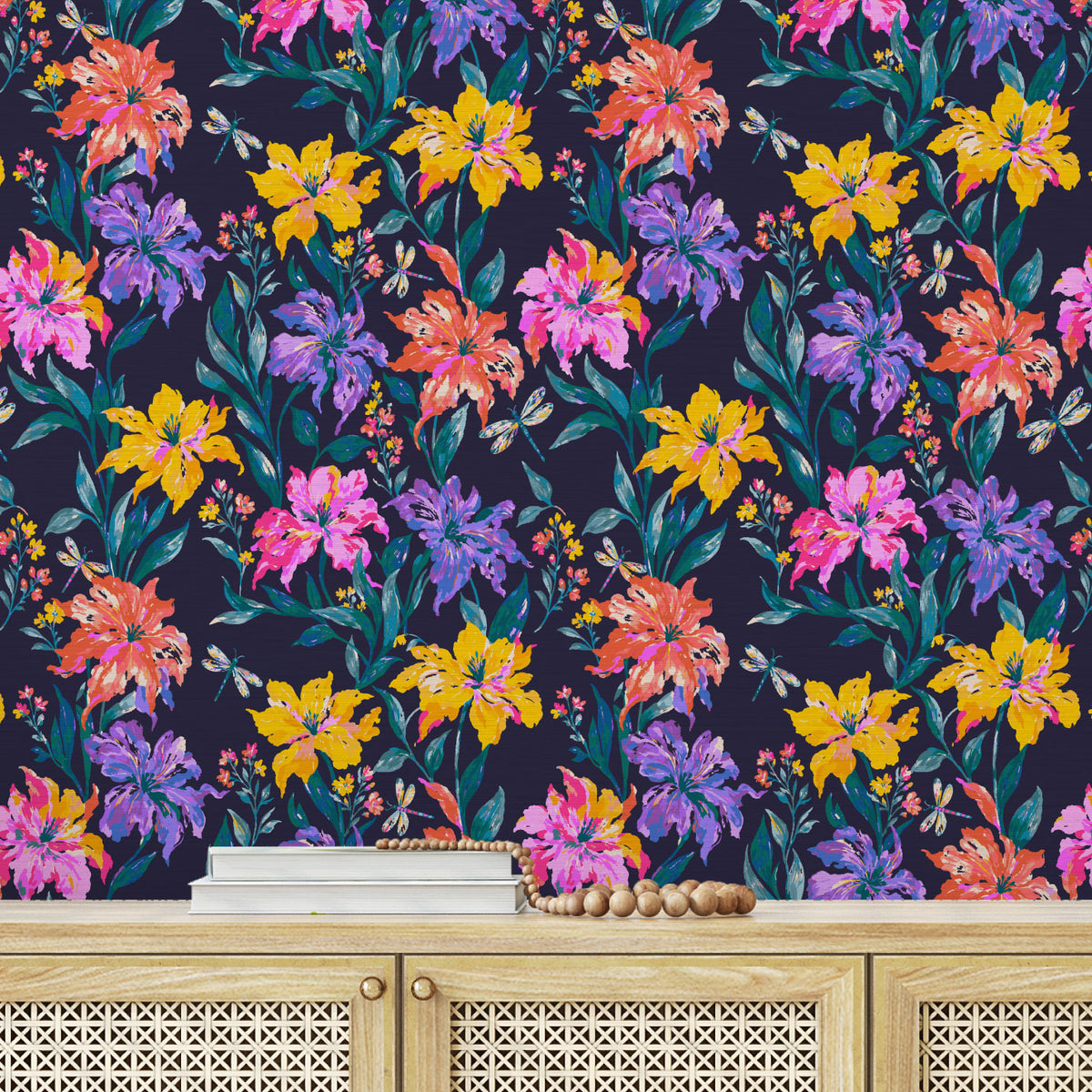 Evening Bloom Firefly Social floral wallpaper above a cane-front cabinet styled with books and wood beads
