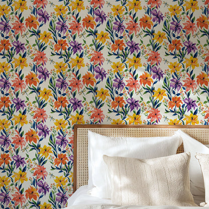 Golden Hour Firefly Social floral wallpaper behind a cane headboard with white and linen bedding